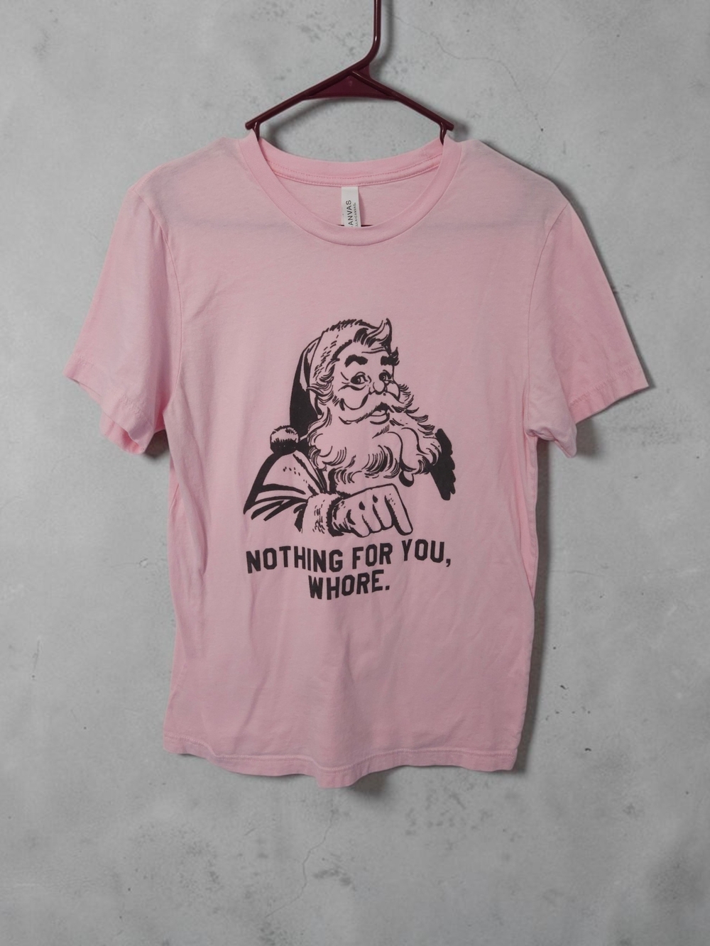Bella Canvas Pink Short-Sleeve Men’s T-Shirt with Black Santa Graphic and Text